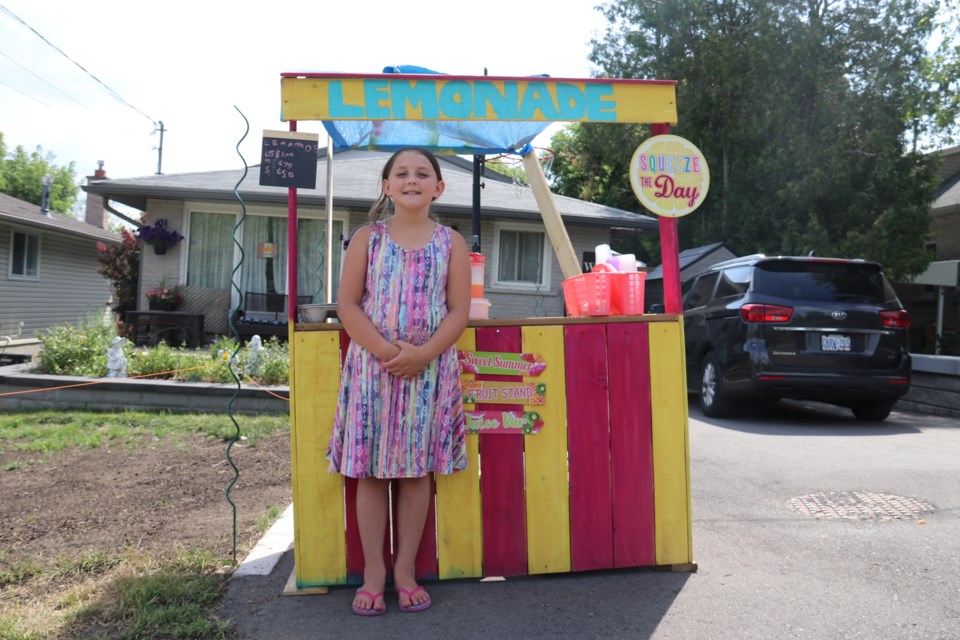Eight-year-old Delilah Pharoah is running her lemonade stand to raise money for the Guelph Humane Society.