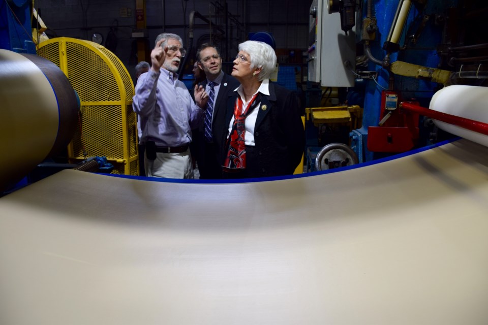 Guelph MPP Liz Sandals toured the Polycorp plant in Elora on Monday morning, accompanied by company vice-president and general manager Andrew Haber, and Centre Wellington Mayor Kelly Linton. Rob O'Flanagan/GuelphToday