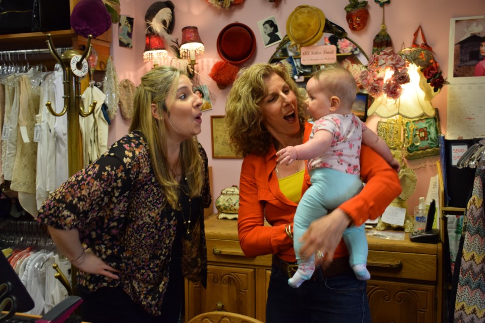 Owners Emily Vamplew, left, her baby Ella Rose, and Beth Cosentino, celebrating 25 years in business. Rob O'Flanagan/GuelphToday