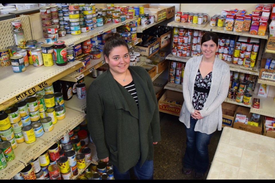 Pauline Cripps, left, and Natasha Wettlaufer of the Guelph Food Bank are getting ready for the Treat or Eat influx of donated food. Rob O'Flanagan/GuelphToday