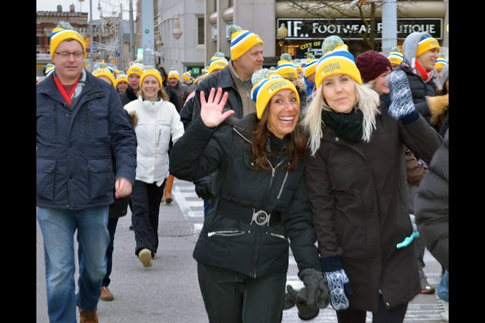 Happy walkers in Downtown Guelph for the Coldest Night of the Year charity event Saturday, Feb. 25, 2017. Troy Bridgeman for GuelphToday.com