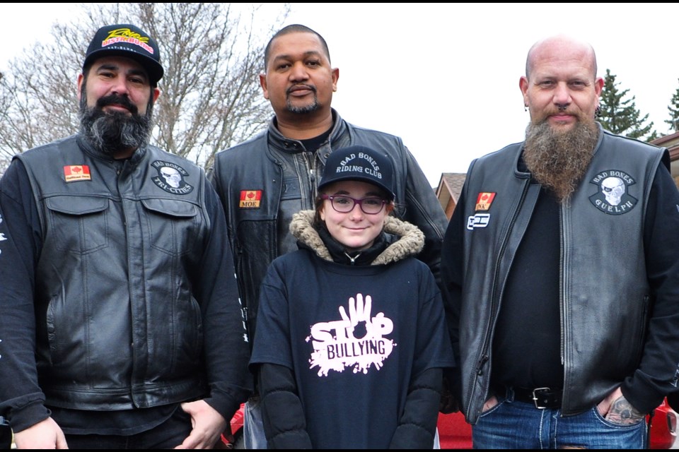 Members of the Bad Bones Riding Club meet with a Guelph girl who was being bullied at school. Tony Saxon/GuelphToday