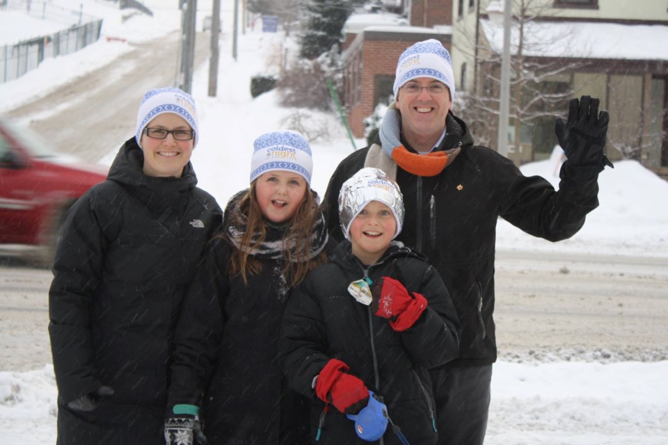 Mayor Cam Guthrie and family participate at the Coldest Night of the Year kick-off event. Photo courtesy of L. Baxter Photography. 