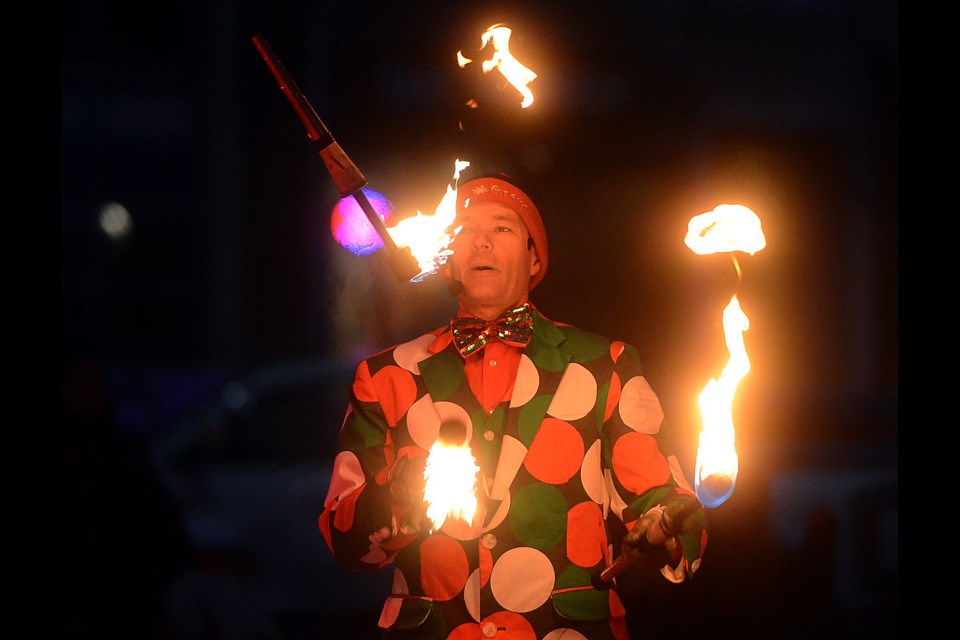 Brant the FireGuy performs on the Market Square ice rink. Tony Saxon/GuelphToday