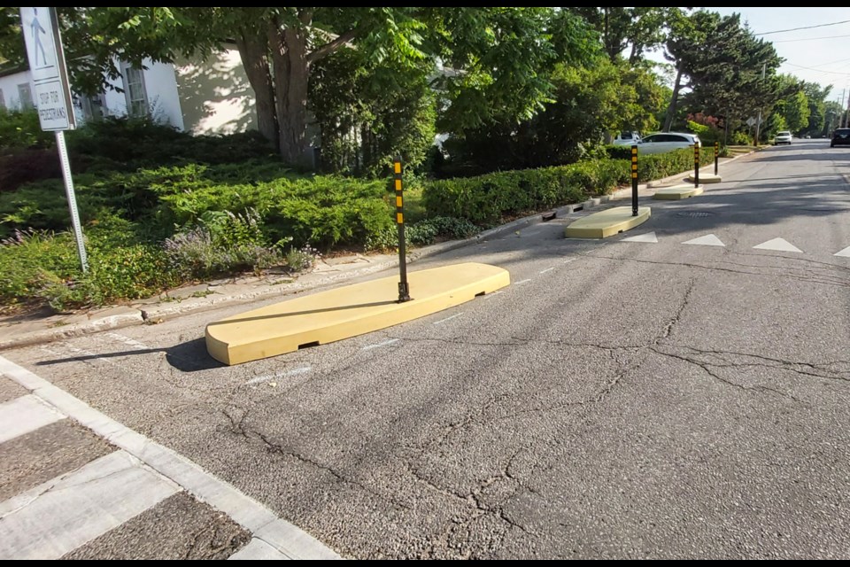 Calming curbs have been installed on Forest Street, at the Maple Street intersection.