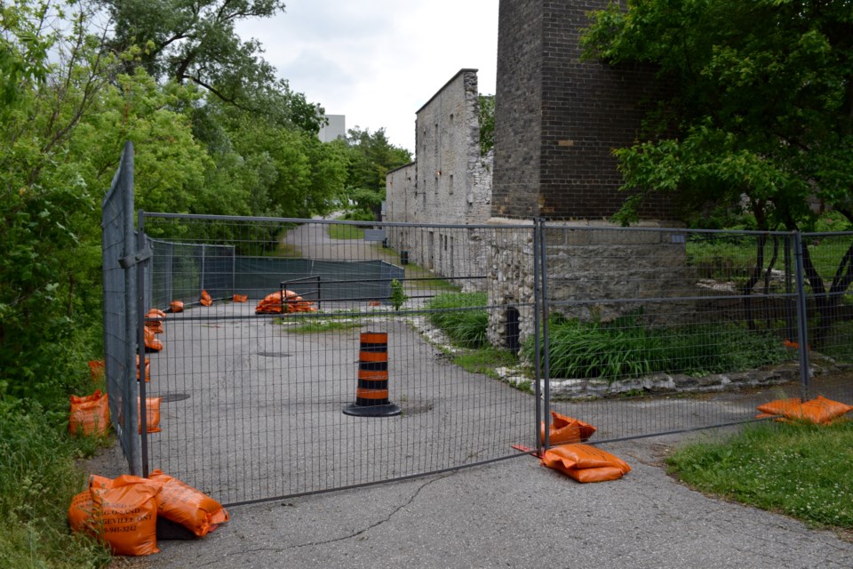 A small area on a path through Goldie Mill park has sinkholes and some soil contamination. The park and its historic structure remain open. 