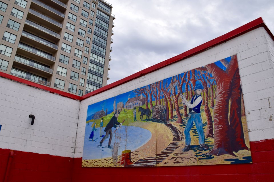 This mural on a car wash on Woolwich Street depicts the founding of Guelph. Rob O'Flanagan/GuelphToday
