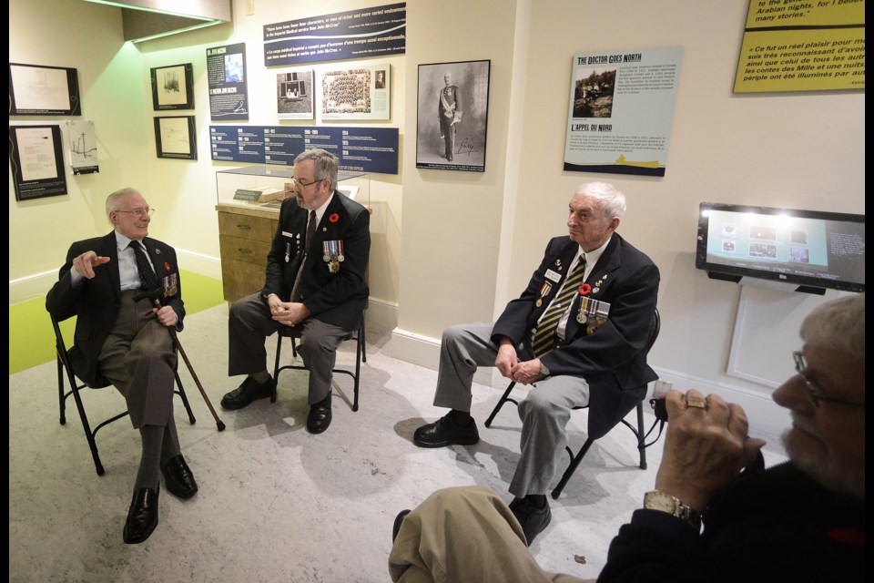 Veterans Earl Setter, from left, Jacques De Winter and Michael Bladon speak at the McCrae House Thank a Veteran event Sunday. Tony Saxon/GuelphToday