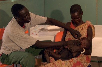 Nurse Administers medication to reduce disease. Photo by Philip Maher for GuelphToday.
