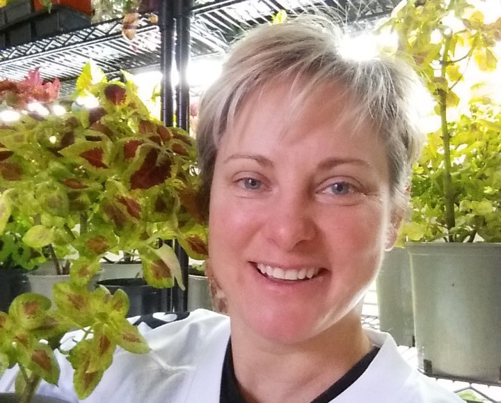 cropped Karen Shlemkevich and coleus plant