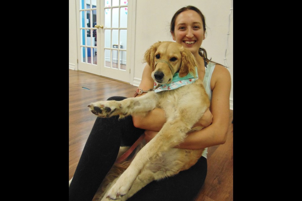 Instructor Kirstie Griffiths and her dog Downy at Loyobo Fit. Barbara Geernaert for GuelphToday