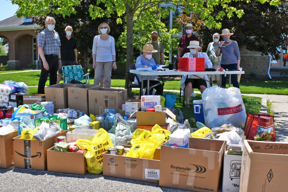 Residents of Village by the Arboretum gather donations for the Guelph Food Bank June 16. Supplied photo