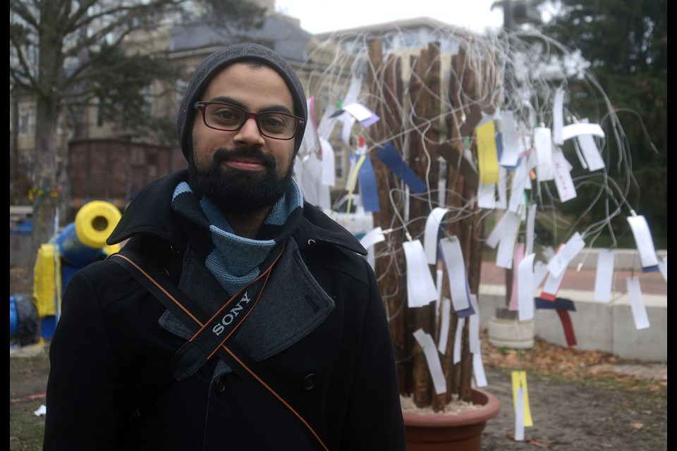 Shawn Desouza-Coelho is the founder of The PoeTree, a community-engagement endeavour that allows people to leave, or take, an original poem. Tony Saxon/GuelphToday