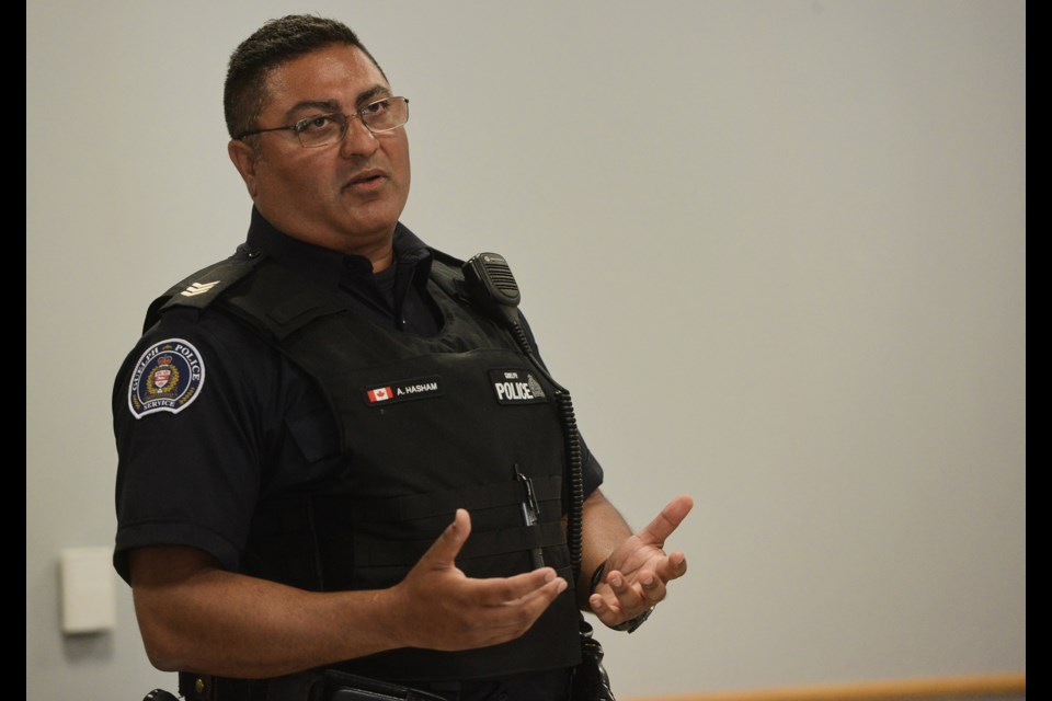 Sgt. Arif Hasham of the Guelph Police speaks at a community meeting Thursday at the Evergreen Community Centre. Tony Saxon/GuelphToday
