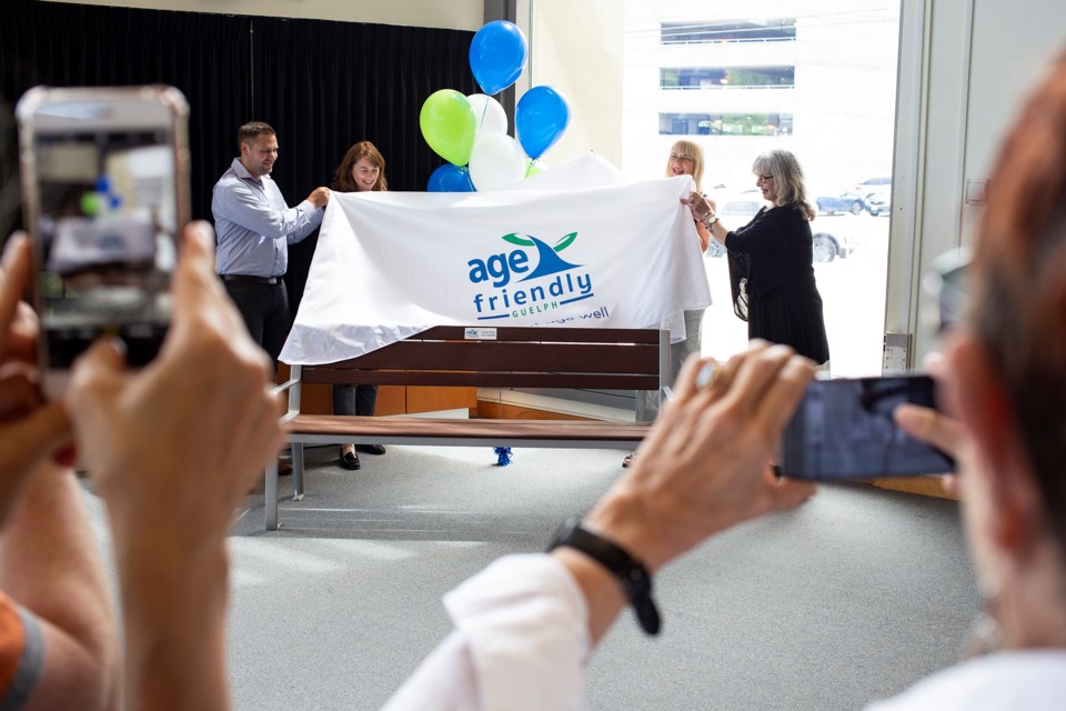 A new indoor senior-friendly bench is unveiled at the River Run Centre on Tuesday as part of Age Friendly Guelph's The Bench Project. Kenneth Armstrong/Guelph
