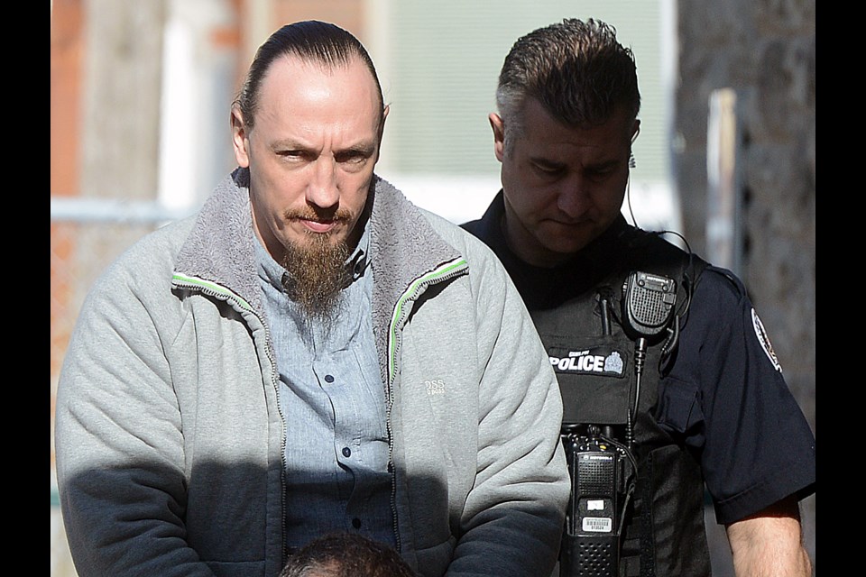Stephan Dietrich, the man accused of murdering his wife Mimi 'Seble' Dietrich, is led into Ontario Superior Court of Justice last April. GuelphToday file photo