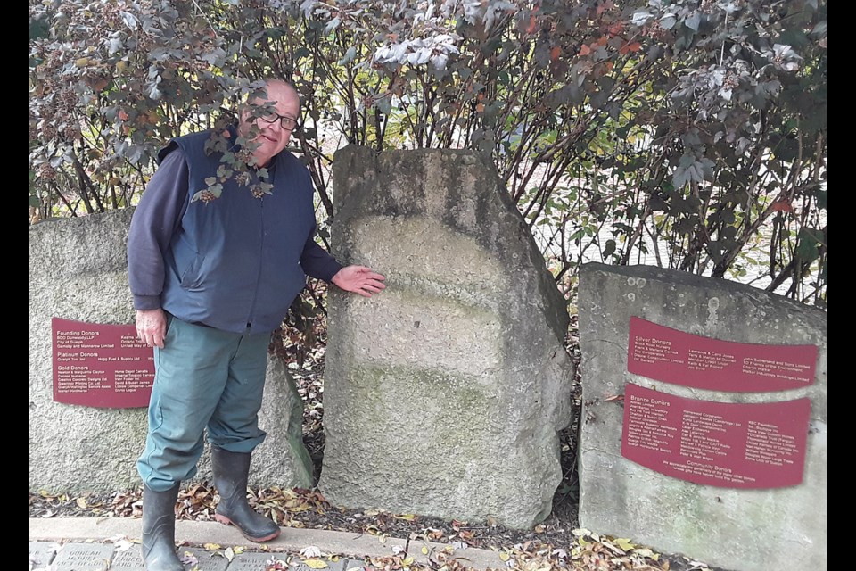 Enabling Gardens president Trevor Barton shows the location of one of the stolen plaques at Riverside Park. Nancy Ariss for GuelphToday
