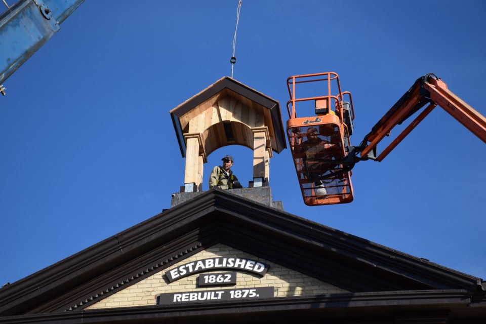 Historical features have recently been returned to the 31 Yarmouth St. building, including this bell tower. It went up on Thursday. Rob O'Flanagan/GuelphToday