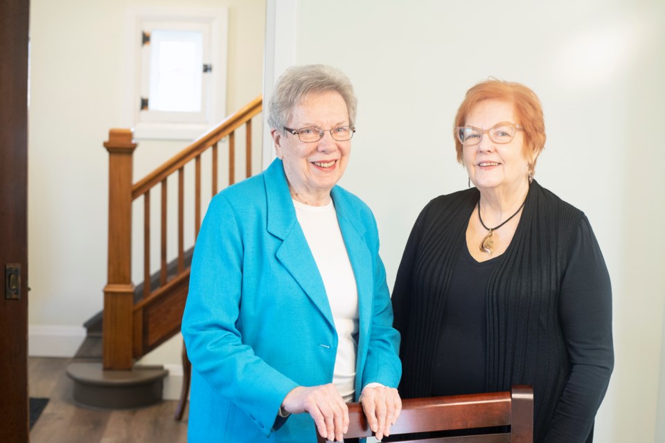 Oak Hill resident Janette Ledwith and real estate agent Bonnie Mullen seen in the dining room of the home converted to co-housing in Rockwood. Kenneth Armstrong/GuelphToday