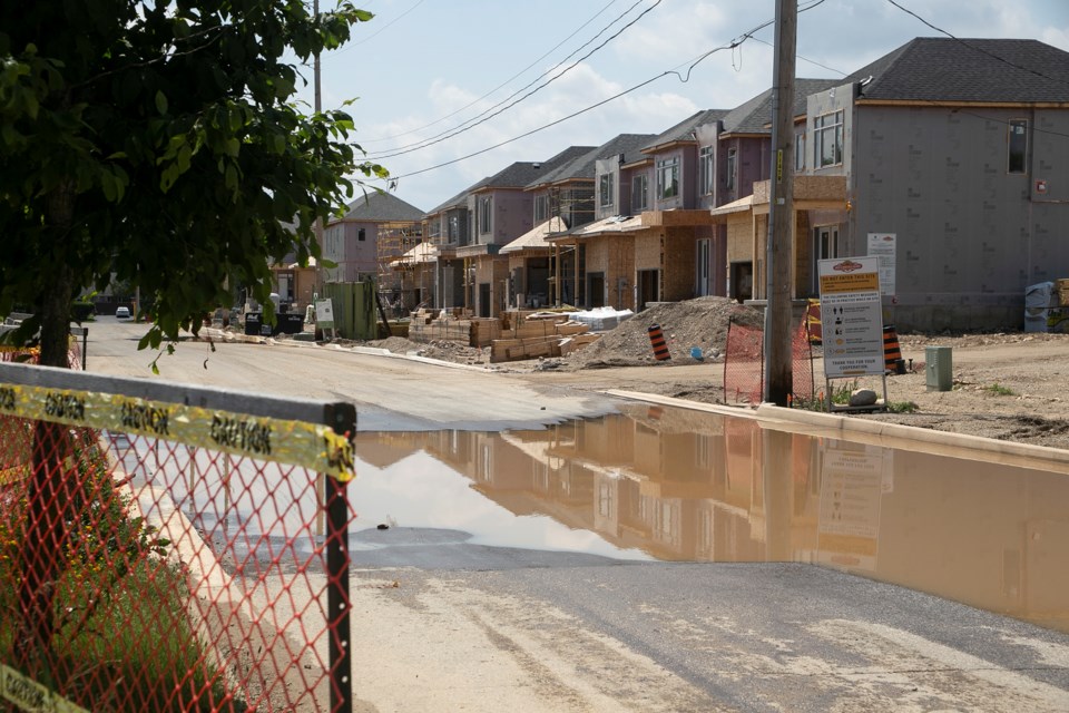 Townhouses under construction by Reid's Heritage Homes on Lowes Road near Gordon Street. Kenneth Armstrong/GuelphToday