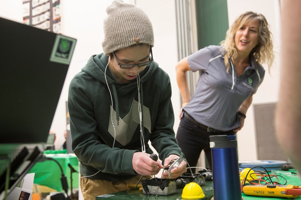 A student completes an electrician test during GCVI’s Tech & Trades Fair on Wednesday. About 1,500 of the high school's students toured 30 booths by colleges, universities and businesses. Kenneth Armstrong/GuelphToday