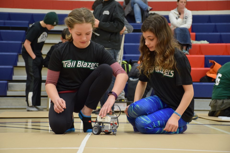 Caterina Earl, left, and Gabriela Faragitakis, of Westminster Woods Public School, get ready for the straight line test. Rob O'Flanagan/GuelphToday