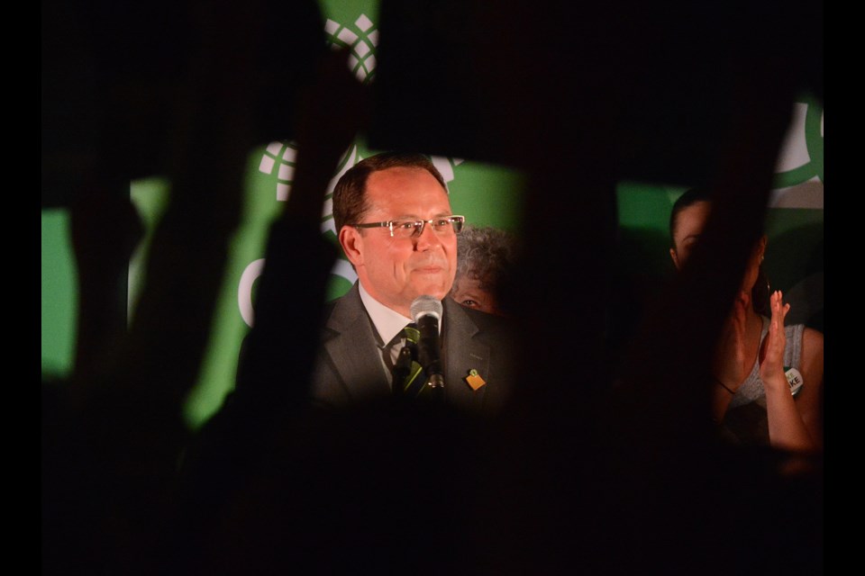 Mike Schreiner pauses as supporters wave placards during his speech after becoming MPP for Guelph Thursday, June 7, 2018, at the Holiday Inn. Tony Saxon/GuelphToday
