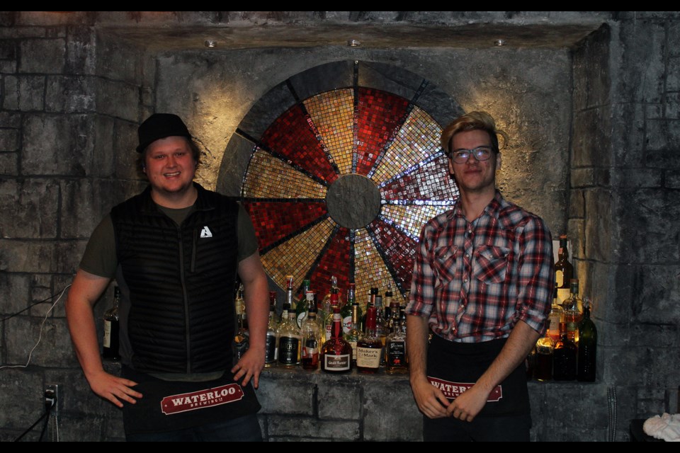 The Round Table employees Matt Blong (left) and Felix Obrascovs standing in the downtown location's licensed bar. Nov. 9, 2017. Nathan Chick for GuelphToday.com