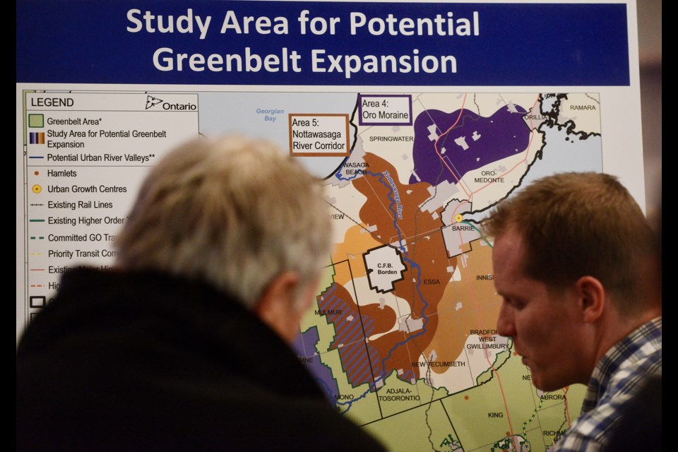 Lots of questions asked at an open house on the proposed Greenbelt expansion Tuesday, Feb. 6, 2018, at the Italian Canadian Club. Tony Saxon/GuelphToday