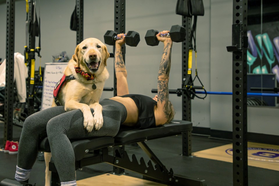 A duo competes in the crossfit challenge for Pawtember. 