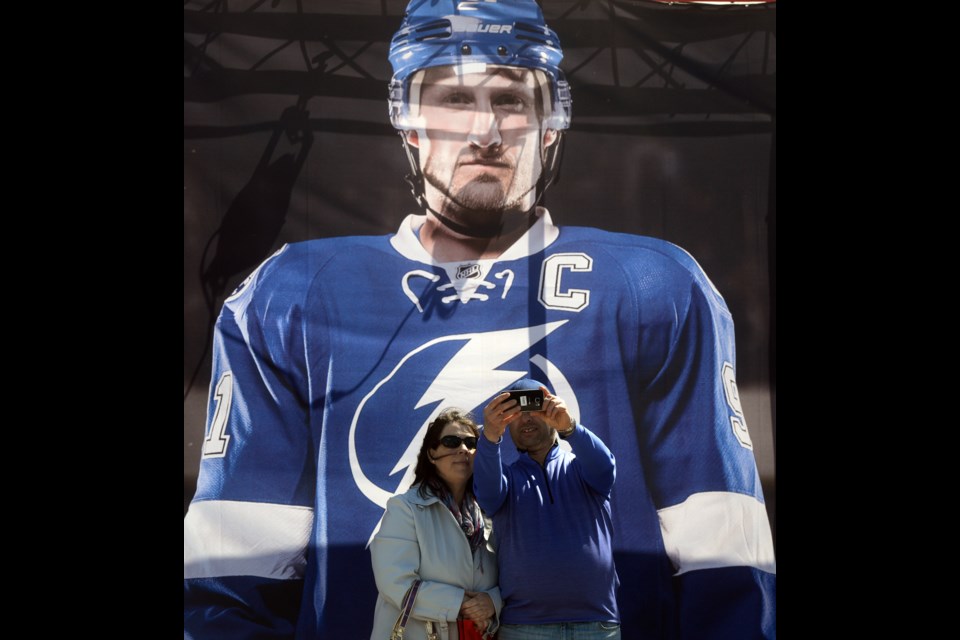 A couple takes a selfie with a rather large Steven Stamkos. Tony Saxon/GuelphToday