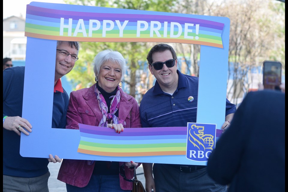Three local levels of government were on hand for the Guelph Pride flag raising Saturday: MP Lloyd Longfield, from left, MPP Liz Sandals and Mayor Cam Guthrie. Tony Saxon/GuelphTody