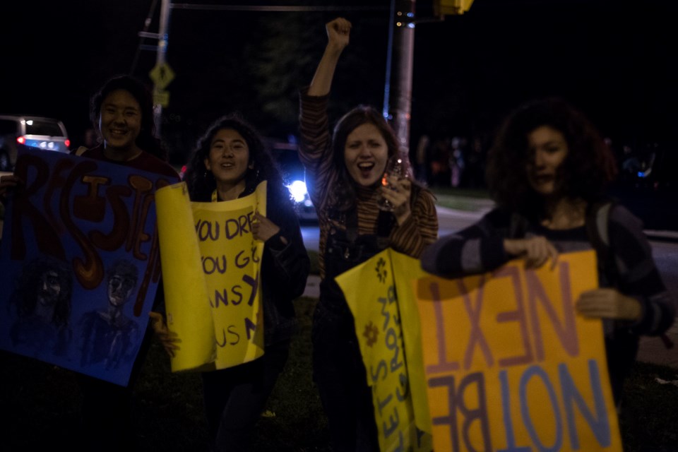 Members of Artsy Activists, who organized last week's rally at city hall against cuts to the provincial sex ed curriculum, seen at Thursday's Take Back the Night march. Kenneth Armstrong/GuelphToday