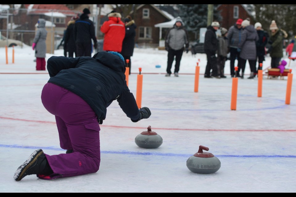 Crokicurl combines curling with the board game of crokinole. (Tony Saxon/GuelphToday)
