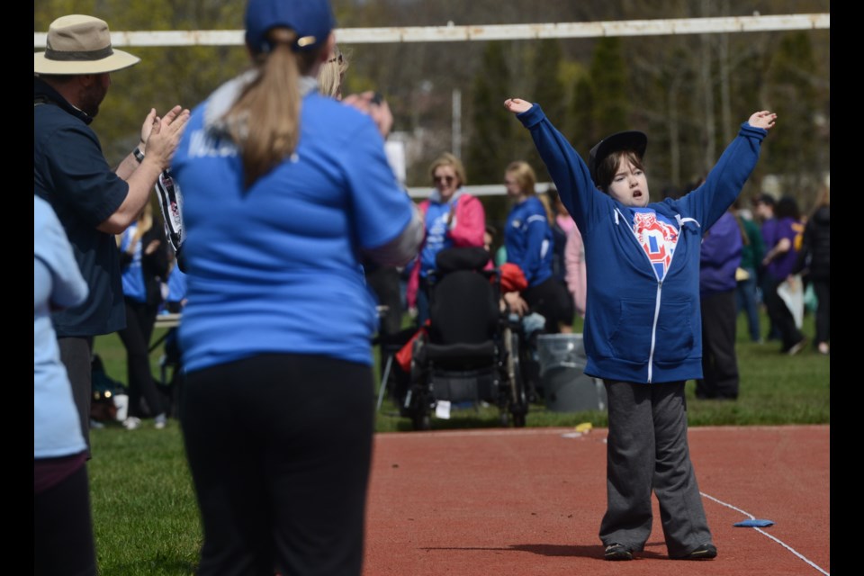 An athlete celebrates their effort at the Special Olympics track and field meet at St. James high school on Wednesday, where elementary and secondary students from both school boards competed. Tony Saxon/GuelphToday