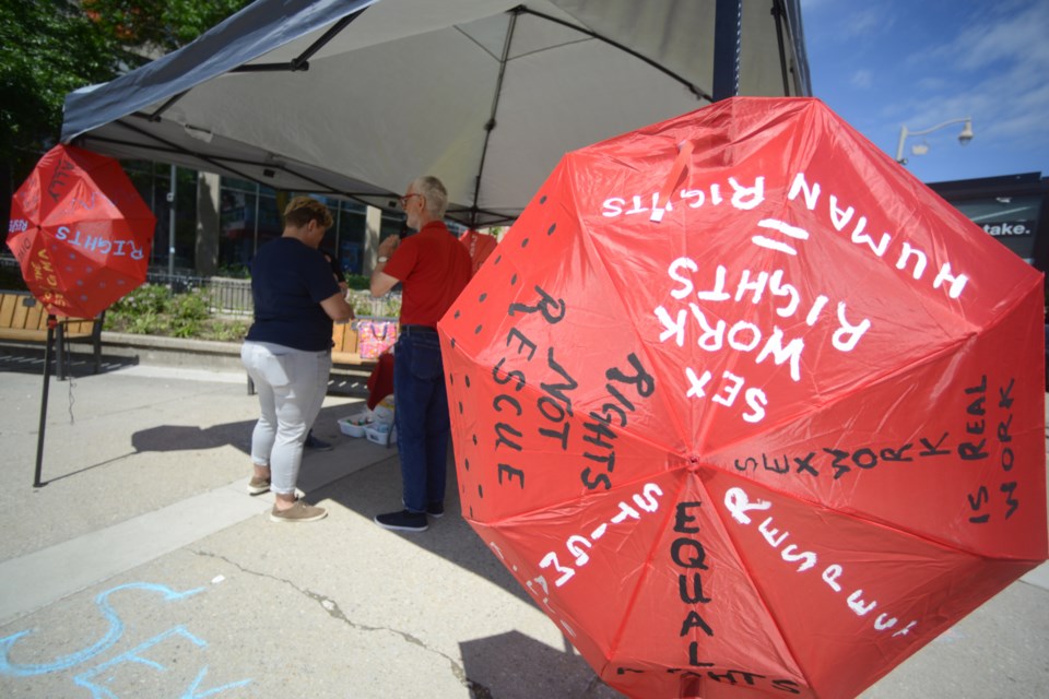 An information booth was set up in Downtown Guelph Monday as part of International Sex Workers' Day. Tony Saxon/GuelphToday