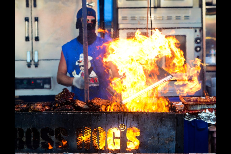 Things get heated at Boss Hogs on the opening night of Ribfest on Friday. Tony Saxon/GuelphToday