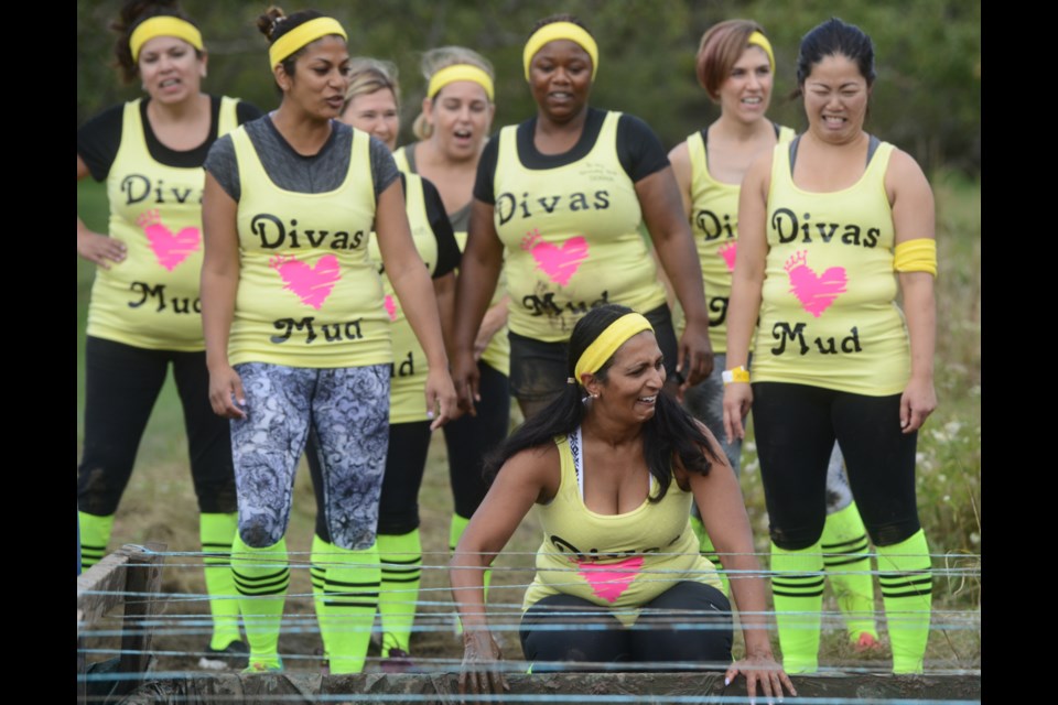 Team Divas Love Mud don't seem to be living up to their name at Mudmoiselle, the annual Canadian Cancer Society fundraiser at Cox Creek Winery on Saturday. Tony Saxon/GuelphToday