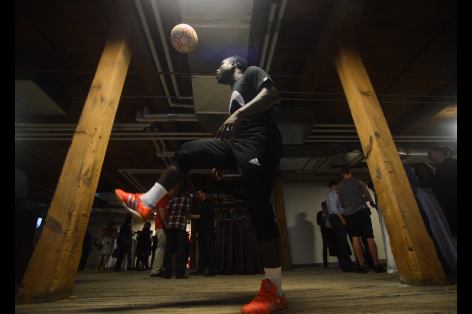Dennis Thompson does some tricks with a soccer ball at the event launch for next summer's The Guelph Games: Canada's Masters Championships Tuesday at Spring Mill Distillery. Tony Saxon/GuelphToday
