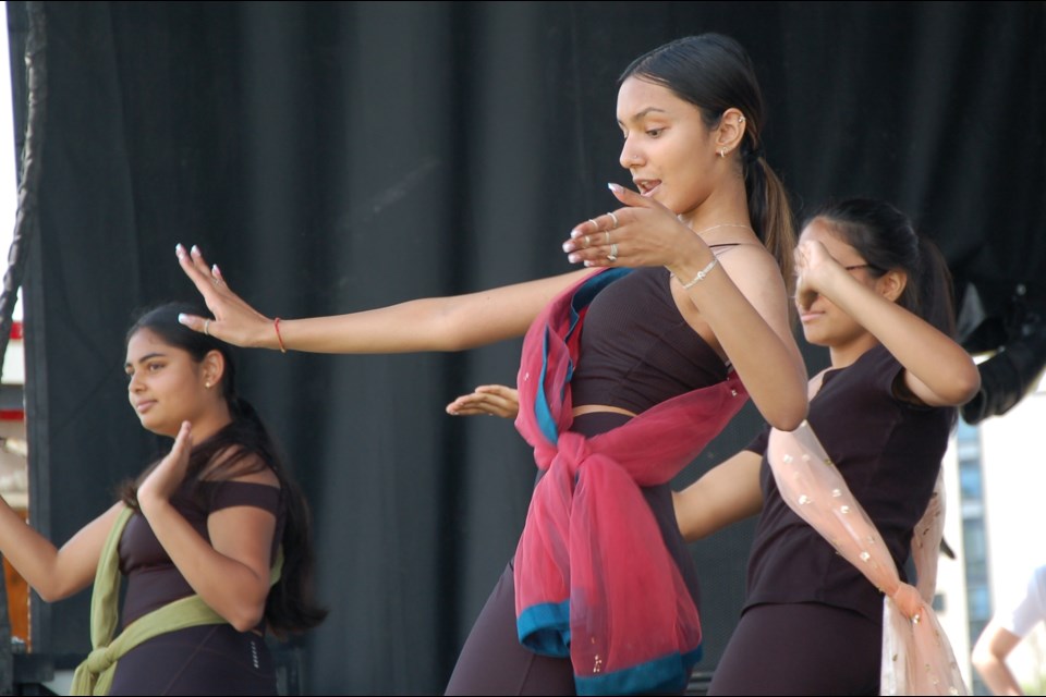 Members of GCVI's Multicultural Club performed a Bollywood dance on the main stage at the Guelph Multicultural Festival Saturday. The festival returned in-person after a two-year hiatus.