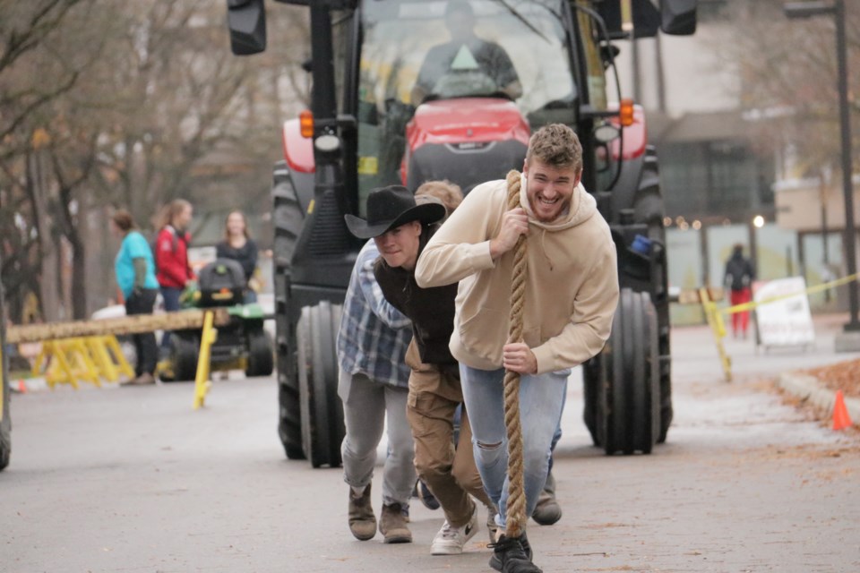Students pull full-sized tractors at U of G's annual Tractor for Tots event to raise money for charity. This year, the funds went to Big Brothers Big Sisters Guelph. 