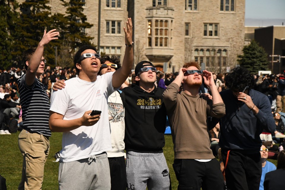 Johnston Green at the University of Guelph was a popular spot to view the eclipse on Monday.