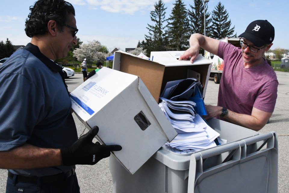 Offered as a fundraiser for local charities, Empower Realty Partners hosted Spring Cleaning for a Cause at St. Paul Catholic School in the south end on Saturday. Donations of clothes and household goods were accepted for Hope House and Goodwill, along with food donations for the Guelph Food Bank. Paul Murphy brought several boxes of paper to be shredded.