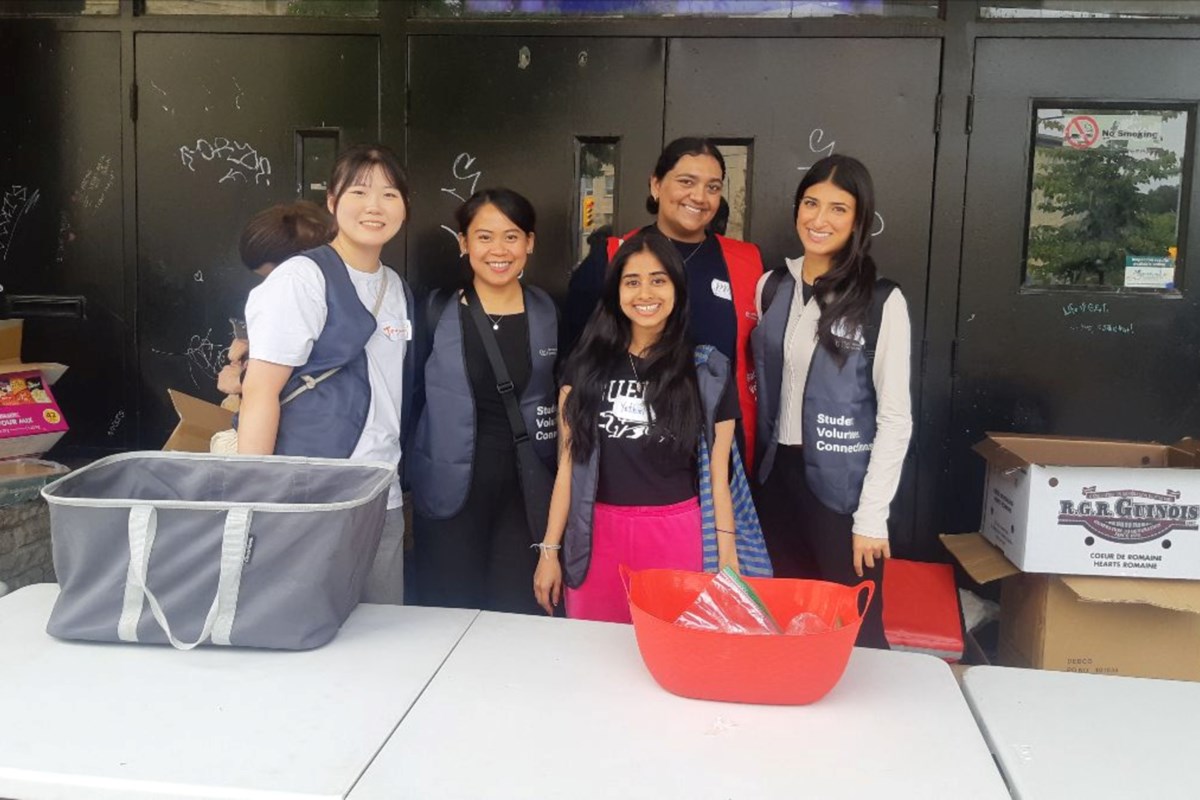 As part of Project Serve, student volunteers and the Helper Bees prepared and distributed 100 free meals for Rachel’s Saturday Table, at the corner of Woolwich and Wyndham Streets