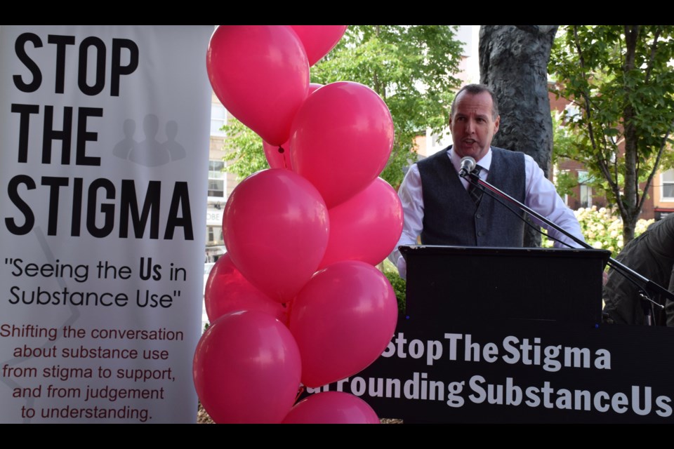 Tom Hammond, executive director of ARCH, addresses the crowd at the Stigma Rally. (Rob O'Flanagan/GuelphToday)