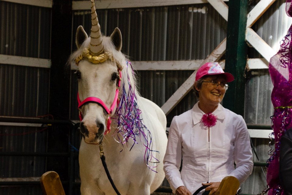 Unicorn wrangler Deb Hewson with her unicorn. 