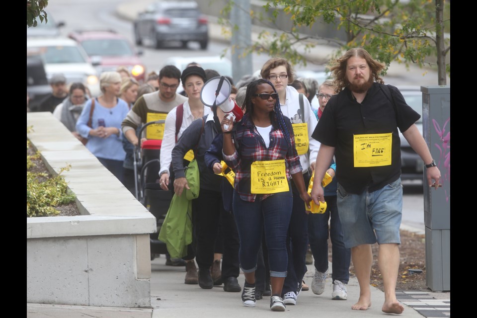 People marching downtown during the Walk for Freedom to raise awareness for human trafficking on Saturday. Kenneth Armstrong/GuelphToday