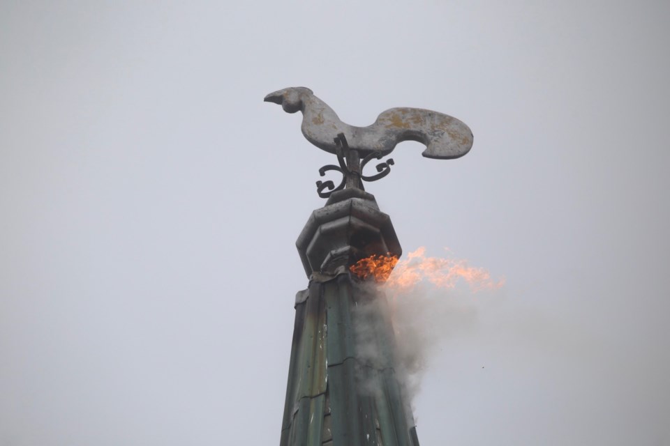 Flames shoot out of the top of the steeple of St. Andrews Presbyterian Church this morning. Kenneth Armstrong/GuelphToday