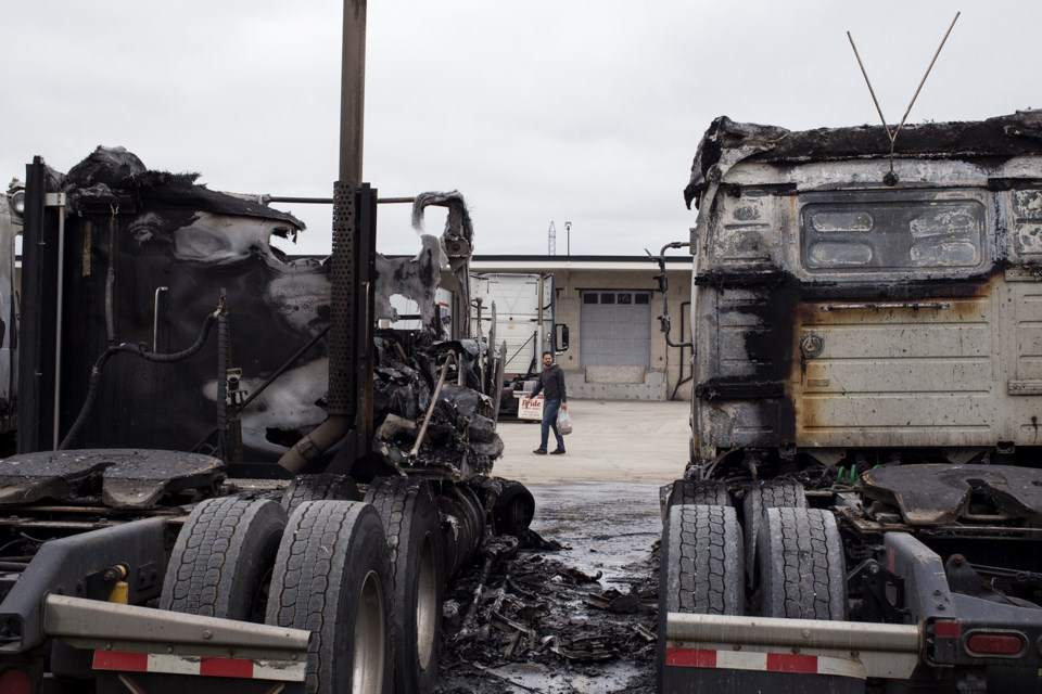Transport trucks seen in the morning on Wednesday, hours after a 2:30 a.m. fire that destroyed six of the trucks on the lot of Trans 99 Logistics at 367 Speedvale Avenue W. Kenneth Armstrong/GuelphToday