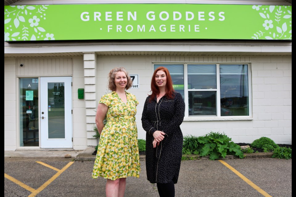 Green Goddess Fromagerie founder, Morgan Mitchell stands to the right of Daniella Gemin, Green Goddess Fromagerie manager, outside the store. 